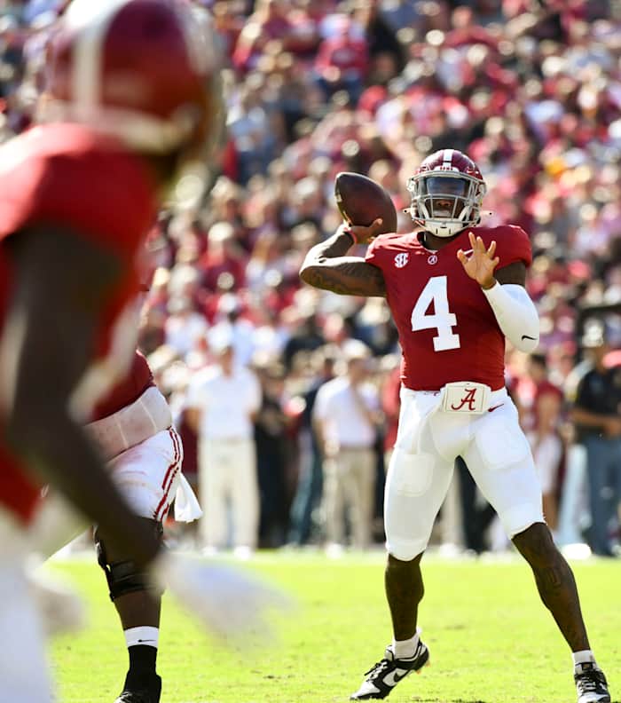 Nov 18, 2023; Tuscaloosa, Alabama, USA; Alabama Crimson Tide quarterback Jalen Milroe (4) throws against the Chattanooga Mocs at Bryant-Denny Stadium. Mandatory Credit: Gary Cosby Jr.-USA TODAY Sports